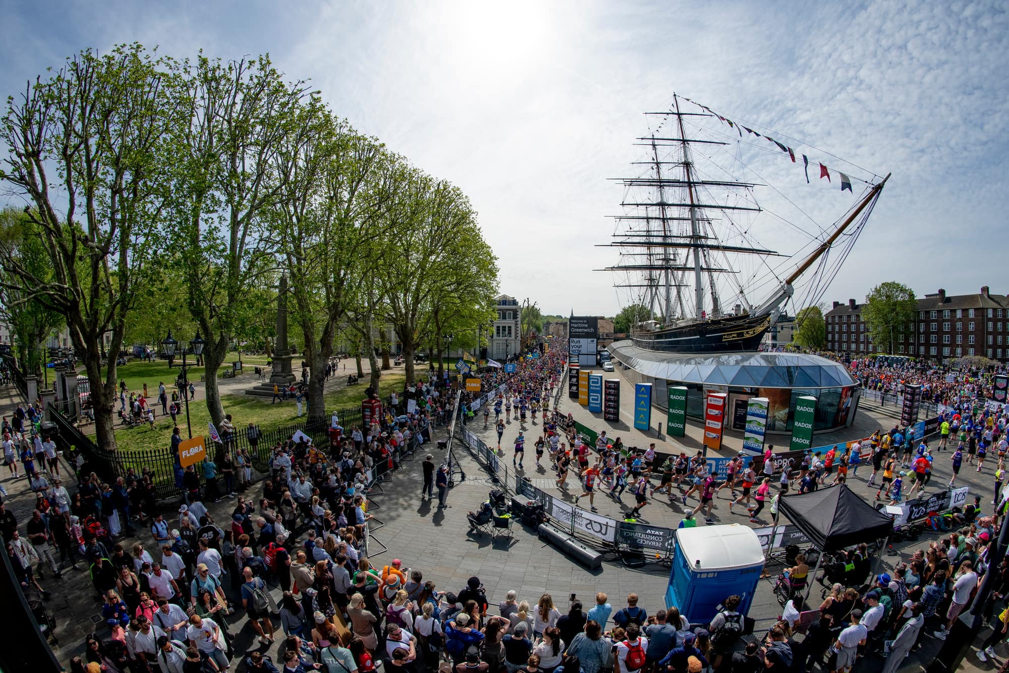 Runners passing the Cutty Sark in Greenwich